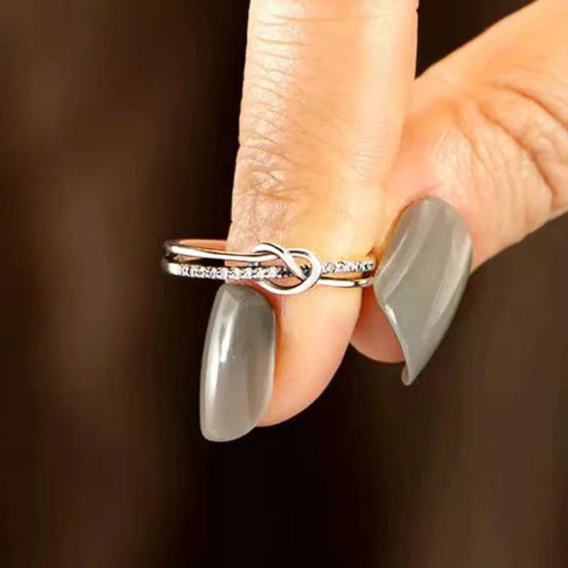 Silver Plated Heart Shaped Twist Cross Design Round Cubic Zirconia Rings