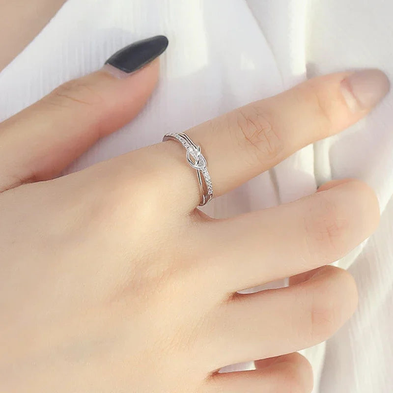 Silver Plated Heart Shaped Twist Cross Design Round Cubic Zirconia Rings