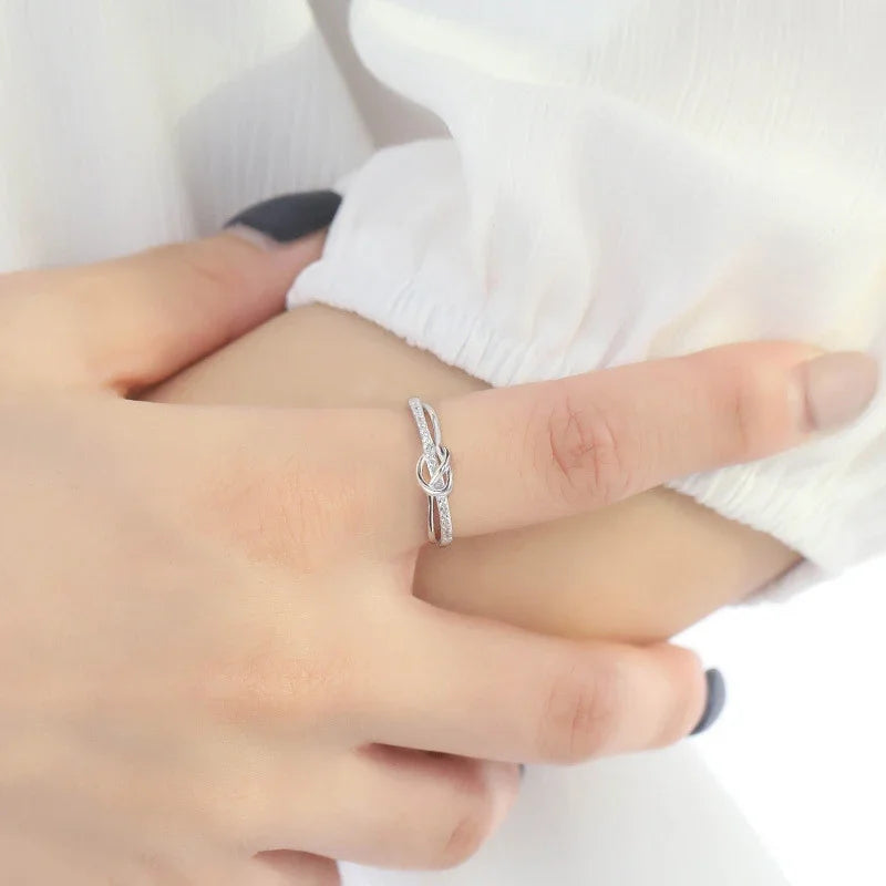 Silver Plated Heart Shaped Twist Cross Design Round Cubic Zirconia Rings