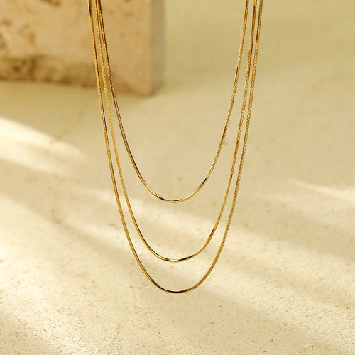 Load image 1 in gallery view. The 18K Gold Plated Stainless Steel Layered Snake Chain Necklace