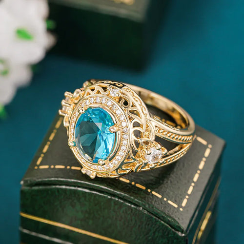 Load image 1 in gallery view. Luxury Oval Shaped Blue Sparkling Zircon Pattern Hollow Design Gold Color Plated Rings for Women Wedding CZ Rings Jewelry