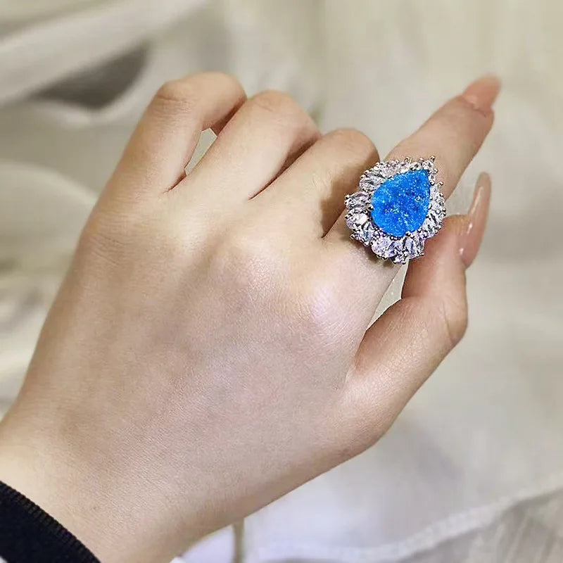 Luxurious Ring Resizable Water Drop Shape Shining Blue Stone with Princess Cut Design