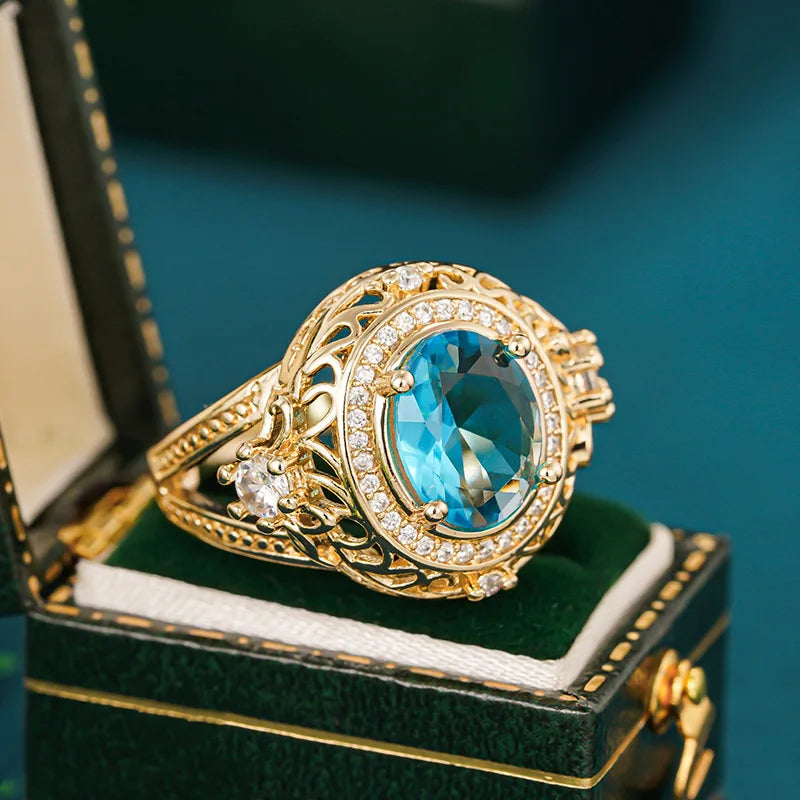 Luxury Oval Shaped Blue Sparkling Zircon Pattern Hollow Design Gold Color Plated Rings for Women Wedding CZ Rings Jewelry