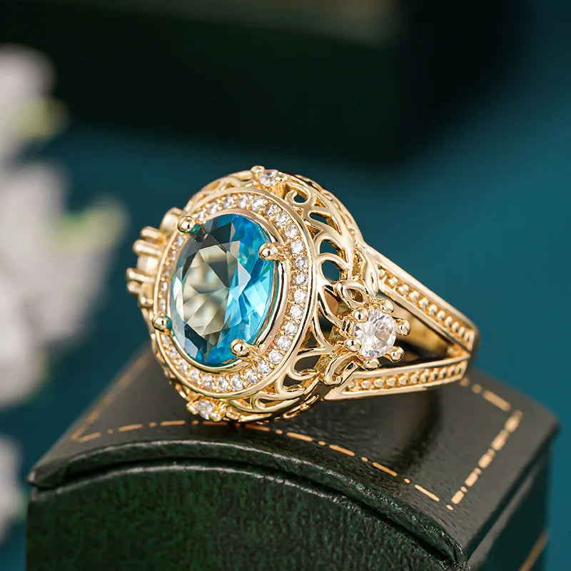Luxury Oval Shaped Blue Sparkling Zircon Pattern Hollow Design Gold Color Plated Rings for Women Wedding CZ Rings Jewelry