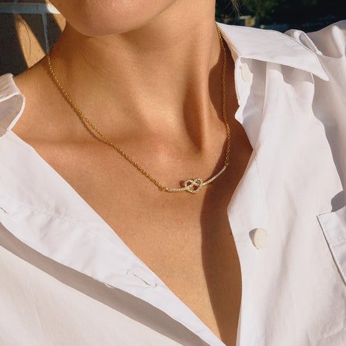 Load image 1 in gallery view. 18K Gold Plate Stainless Steel White Rhinestone Eternal Love Heart Knot Smile Face Necklace