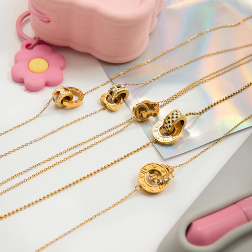 Load image 1 in gallery view. Interlocking Pendant Necklace for Kids and Woman 18K Gold Plated